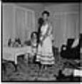 Image of Izzie Smith posing in semi-formal attire, Seattle, circa 1953