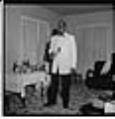 Image of Durwood Moore posing in formal attire, Seattle, circa 1953