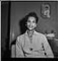 Image of Izzie Smith sitting at home, Seattle, circa 1953
