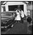 Image of Bride and groom exiting car, Seattle, September 27, 1959