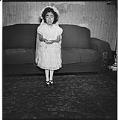 Image of Girl posing in First Communion dress, Seattle, circa 1953