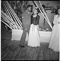 Image of A couple standing near bandstand , Seattle, circa 1953