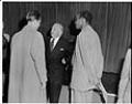 Image of Phil Burton and Walter White talking with Bill Ross, Seattle, November 20, 1949