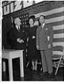 Image of Walter White posing with two others, Seattle, November 20, 1949