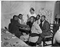 Image of Partygoers playing poker, Seattle, circa 1950