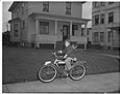 Image of Boy posing on a bicycle, Seattle, circa 1950