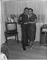 Image of Couple posing in a living room, Seattle, circa 1950