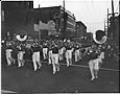 Image of Post Office band marching in a parade, Seattle, circa 1953