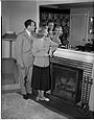 Image of Italian Club President and wife in front of mirror, Seattle, circa 1950