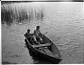 Image of Butch Smith and Sonny Norris sitting in rowboat, Seattle, July 4th, 1947