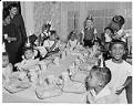 Image of Children around table at birthday party, Seattle, circa 1955