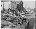 Image of Women riding in East Madison Seafair parade, Seattle, circa 1953