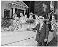 Image of Black community Queen and princesses  riding in Seafair International Parade, Seattle, circa 1953