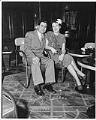 Image of Man and woman sitting at Italian Club, Seattle, circa 1953