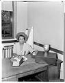 Image of NACWC Executive Secretary Ruby Kendrick seated at desk, Seattle, August 1948