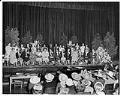 Image of NACWC convention delegates sitting on stage, Seattle, August 1948