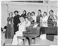 Image of NACWC convention delegates around piano, Seattle, August 1948