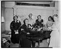 Image of NACWC convention delegates around piano, Seattle, August 1948