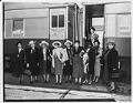 Image of NACWC convention delegates near train at King Street Station, Seattle, August 1948
