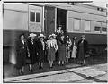 Image of NACWC convention delegates near train at King Street Station, Seattle, August 1948