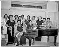 Image of NACWC convention delegates around piano, Seattle, August 1948