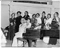 Image of NACWC convention delegates around piano, Seattle, August 1948