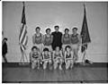 Image of San Francisco Saints basketball team posing for team photo, Seattle, December 1948
