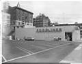 Image of Kimura family posing in front of their store, Seattle, circa 1953