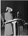 Image of Ola Browning speaking at fashion show, Seattle, circa 1953