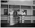 Image of Men standing at the rail of a ship, Seattle, circa 1953