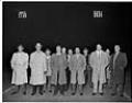 Image of Men standing on football field at high school reunion, Seattle, circa 1953