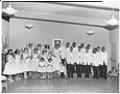 Image of Wedding party posing at church, Seattle, circa 1953