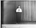 Image of Boy posing on stage after First Communion, Seattle, circa 1953
