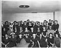 Image of Alpha Kappa Alpha sorority sisters posing with crest, Seattle, circa 1962