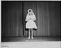 Image of Girl posing on stage after First Communion, Seattle, circa 1953