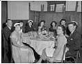 Image of Guests posing at wedding reception, Seattle, circa 1953