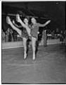 Image of Figure skaters posing on ice rink, Seattle, circa 1953