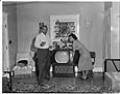 Image of Couple with television set in living room, Seattle, circa 1953