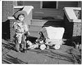 Image of Mrs. Kreisel's grandchild in cowboy costume, Seattle, circa 1949