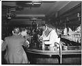 Image of Bartenders and patrons at the Italian Club, Seattle, circa 1950
