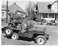 Image of Joe Smith sitting in Jeep, Seattle, circa 1947