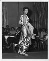 Image of Woman modeling dress at fashion show, circa 1955