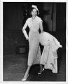 Image of Woman modeling dress at fashion show, circa 1955