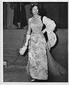 Image of Woman modeling dress at fashion show, circa 1955