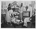Image of People at home opening gifts, Seattle, circa 1955