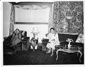 Image of Couple seated in a living room, circa 1954