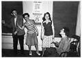 Image of Two women and two men in a union office, circa 1944