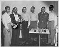 Image of Members of a bowling team with trophies, Seattle, circa 1956