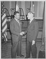 Image of Two man shaking hands at Communist Party convention, Seattle, May 6, 1944