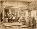 Image of Horton family posing together on porch, Seattle, circa 1890